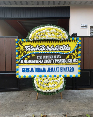 Papan Bunga Duka di Penggoli